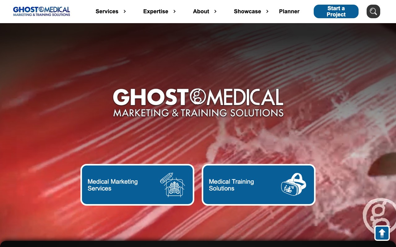 Ghost Medical homepage, headlined Marketing and Training Solutions, with two doors for medical marketing services and medical training solutions over a surgical close-up